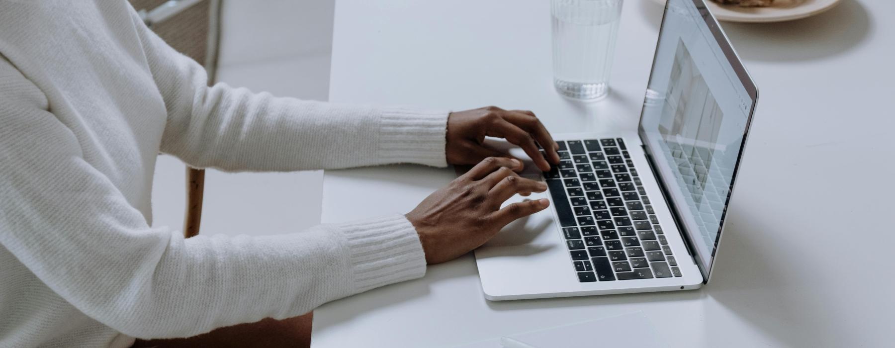 a woman working on a laptop