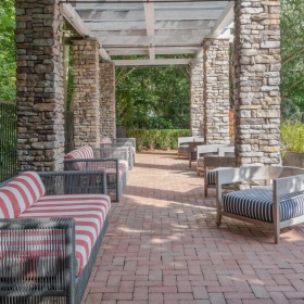 Take advantage of all The Hartley has to offer covered patio with chairs and couches
